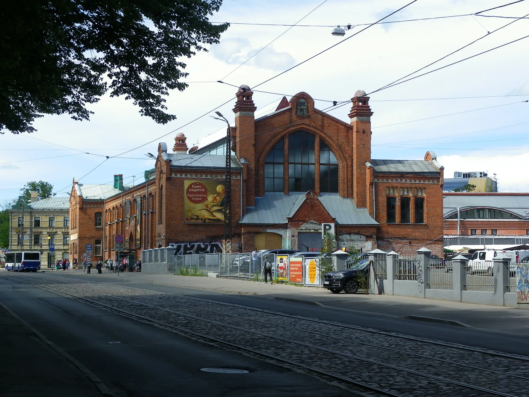 The historic red-brick Agenskalns Market hall on the left bank of Riga, with arched gable window and corner turrets