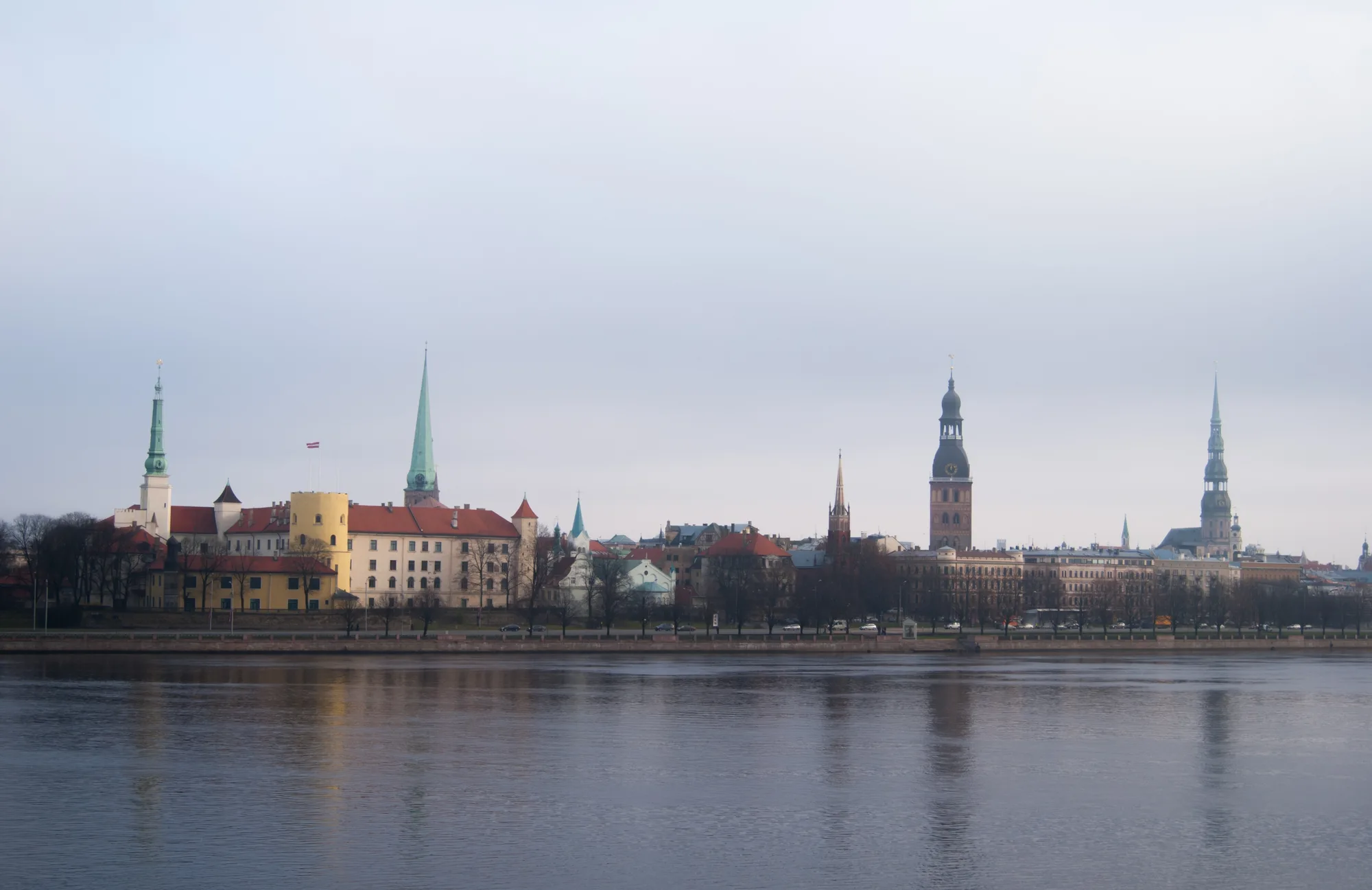 The Riga Old Town skyline across the Daugava: Riga Castle, the Cathedral tower and St. Peter's spire