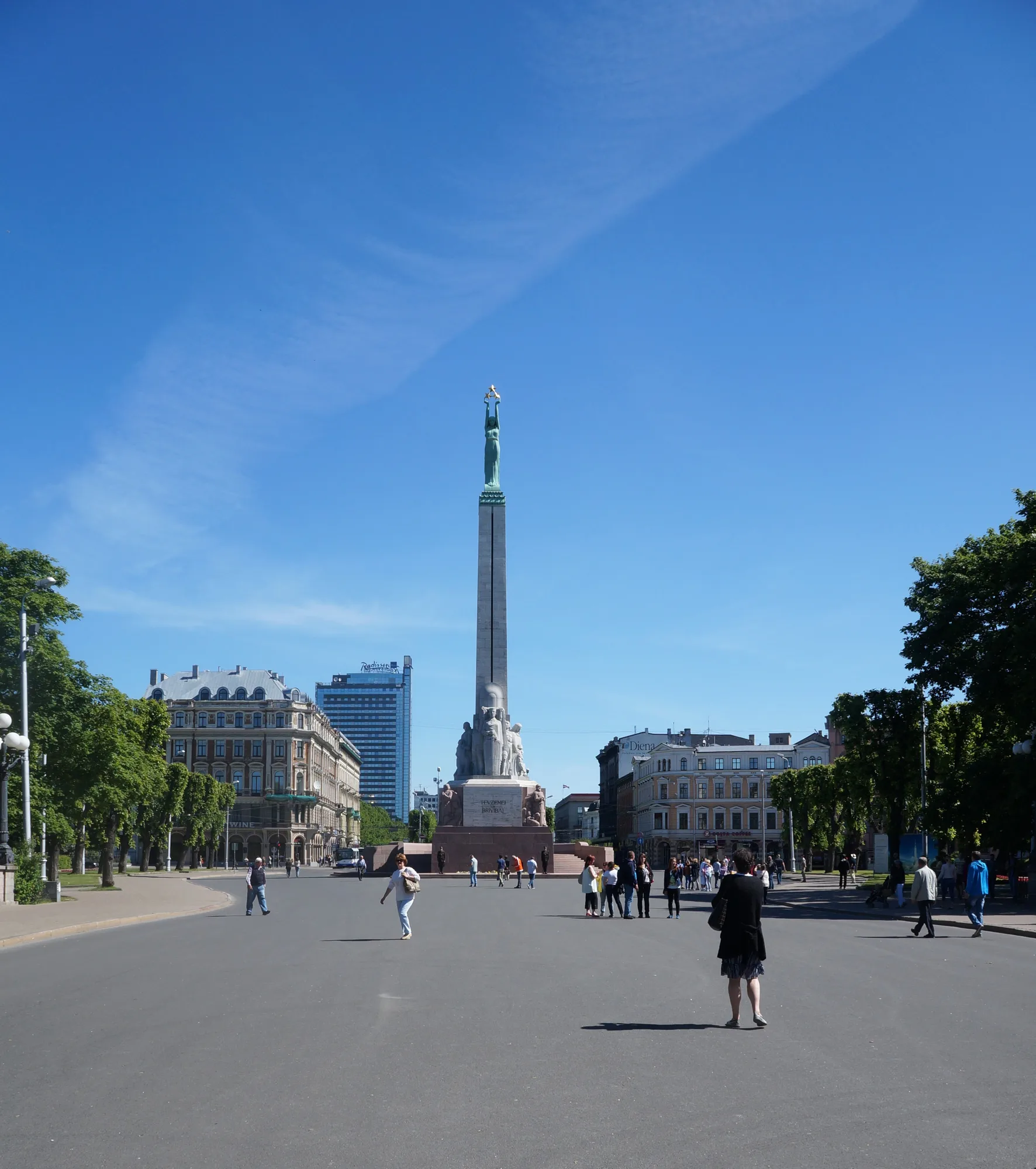 Riga's Freedom Monument, a tall stone column topped by the bronze figure Milda holding three stars aloft