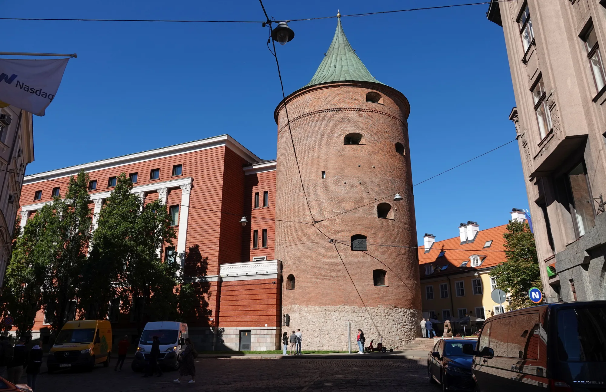 The round medieval red-brick Powder Tower (Pulvertornis) with a conical roof, part of Riga's old city wall